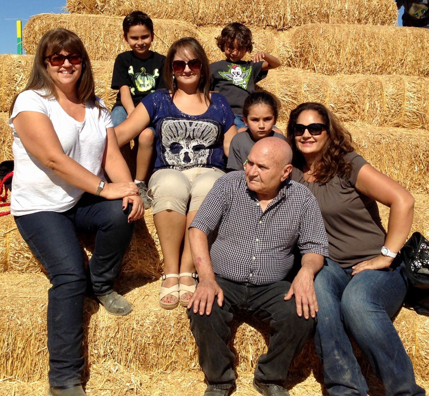 Ahmad Dolkhani sitting with family